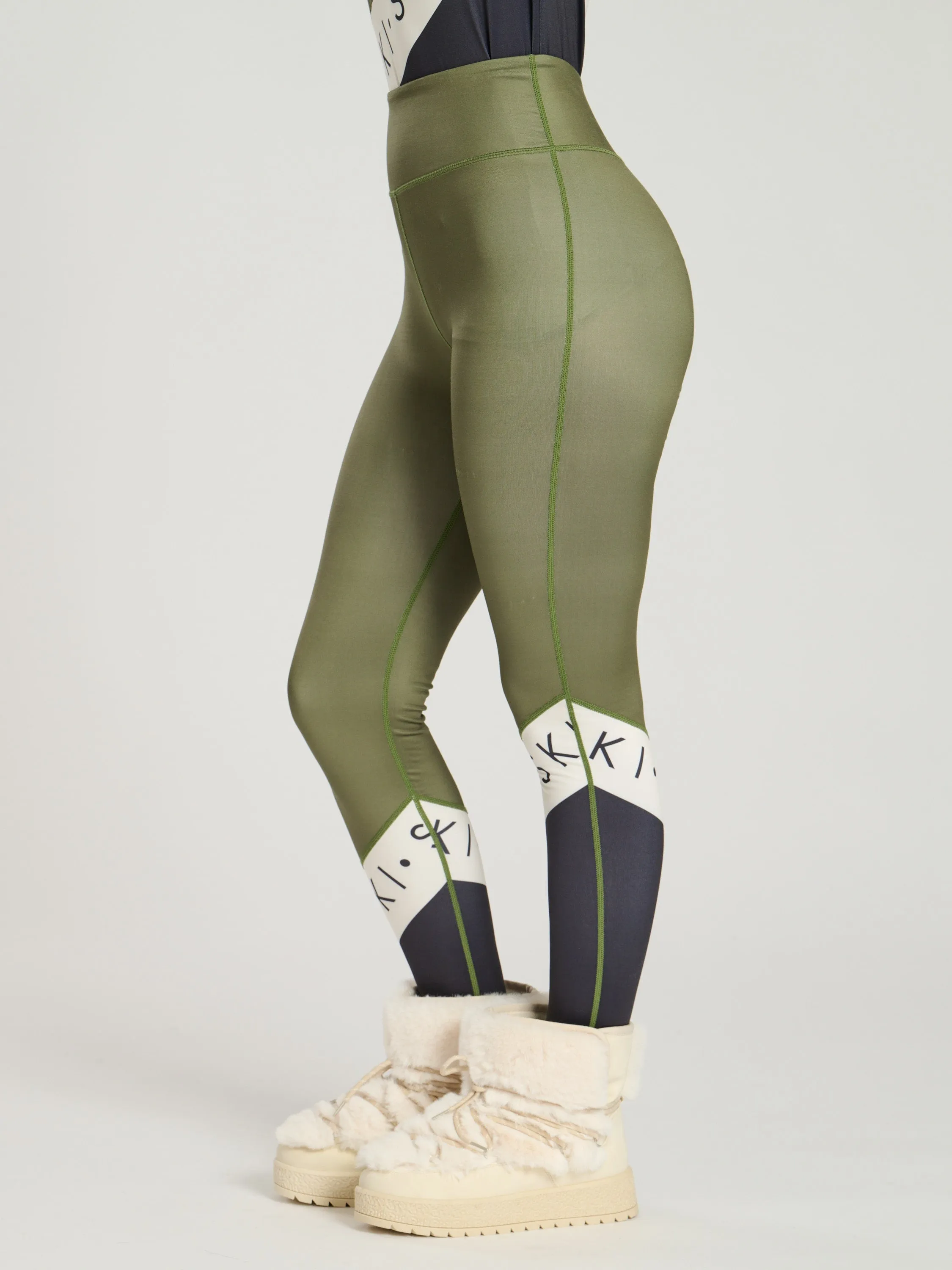 The 'Alpine' Ski Slogan Leggings In Olive