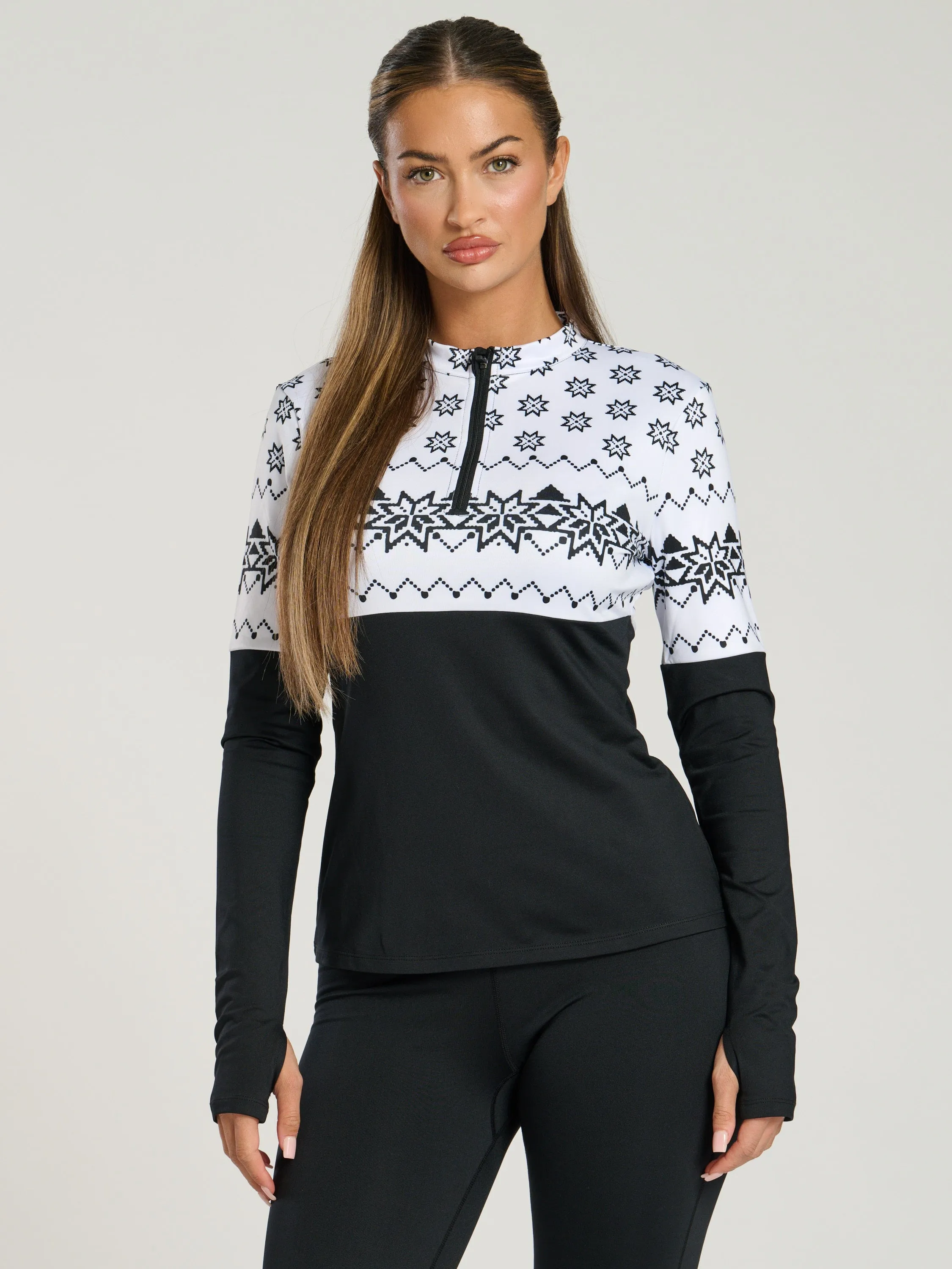 The 'Alps' half zip base layer in black and white